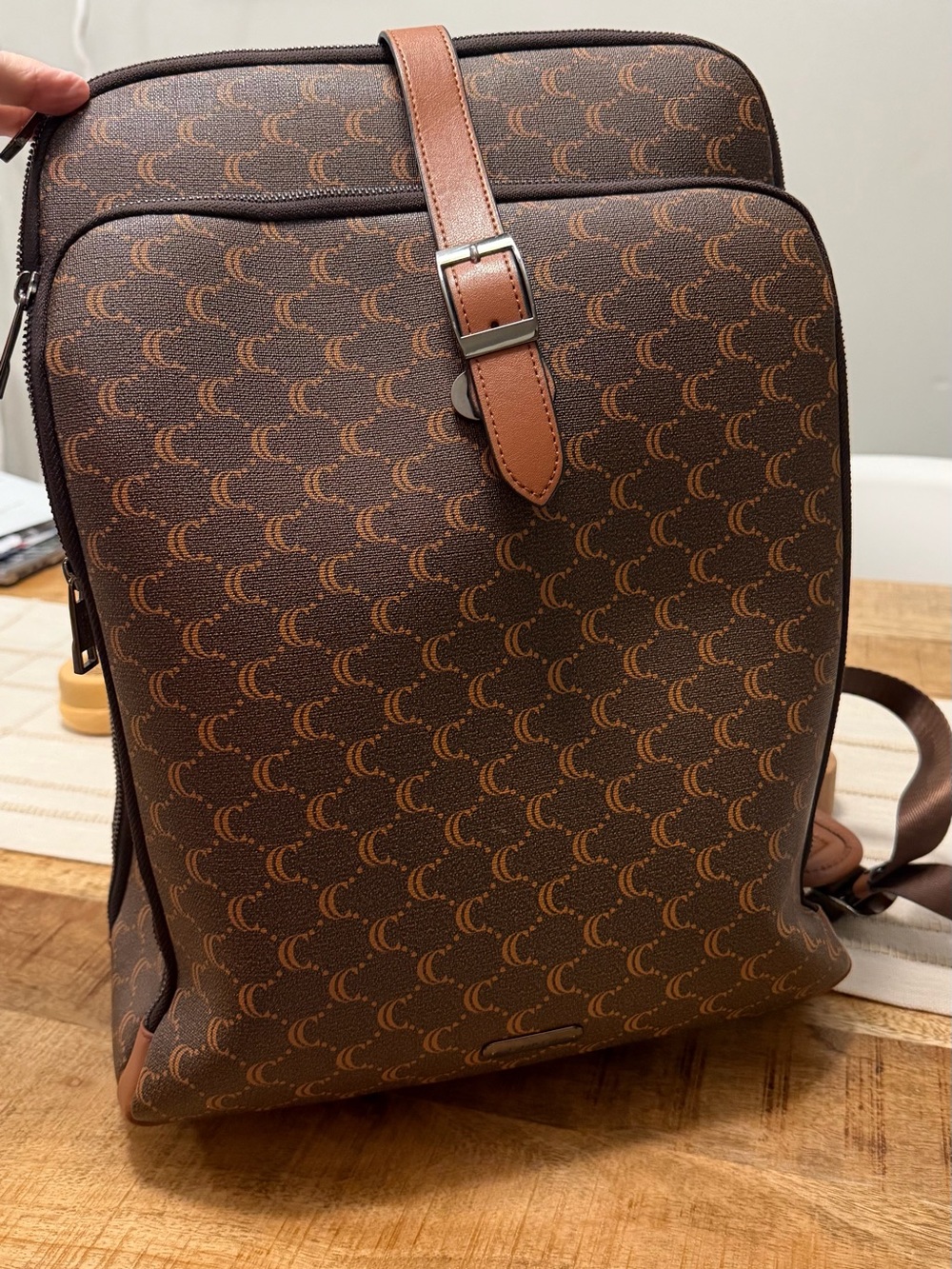 Cluci laptop Backpack with Crescent Pattern and different pockets.